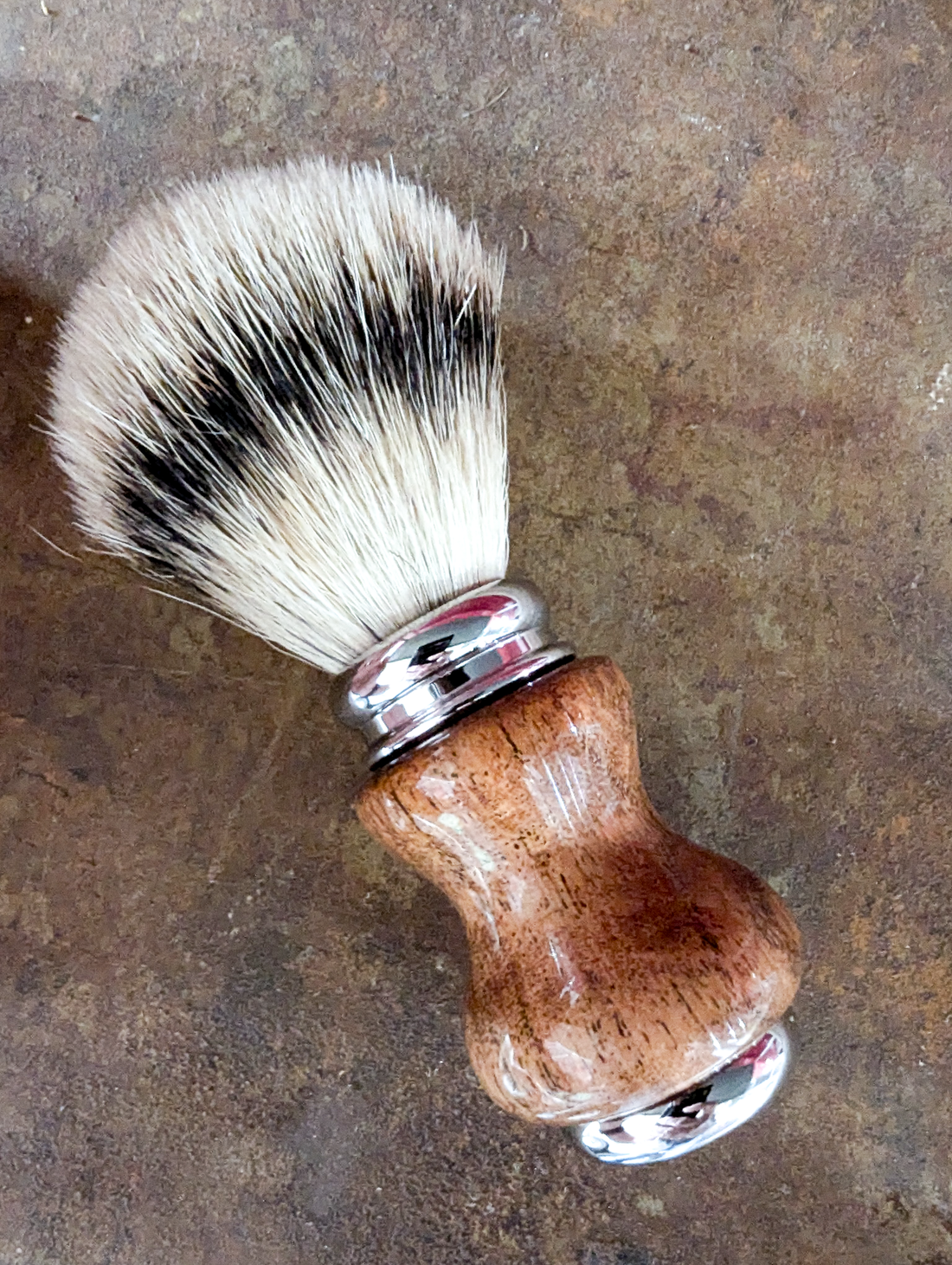 close up of a silver tip badger shave brush with a mesquite handle from mc shave gear