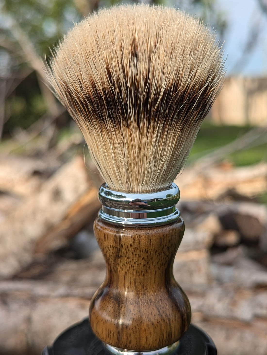 Silvertip badger shave brush with black limba handle outside