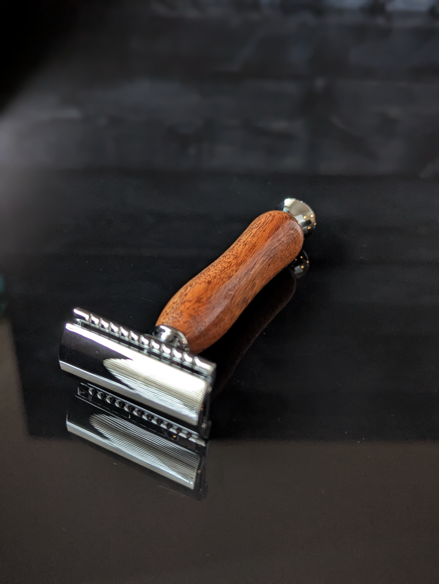 front view of a hand-crafted safety razor with a mesquite handle from MC Shave Gear