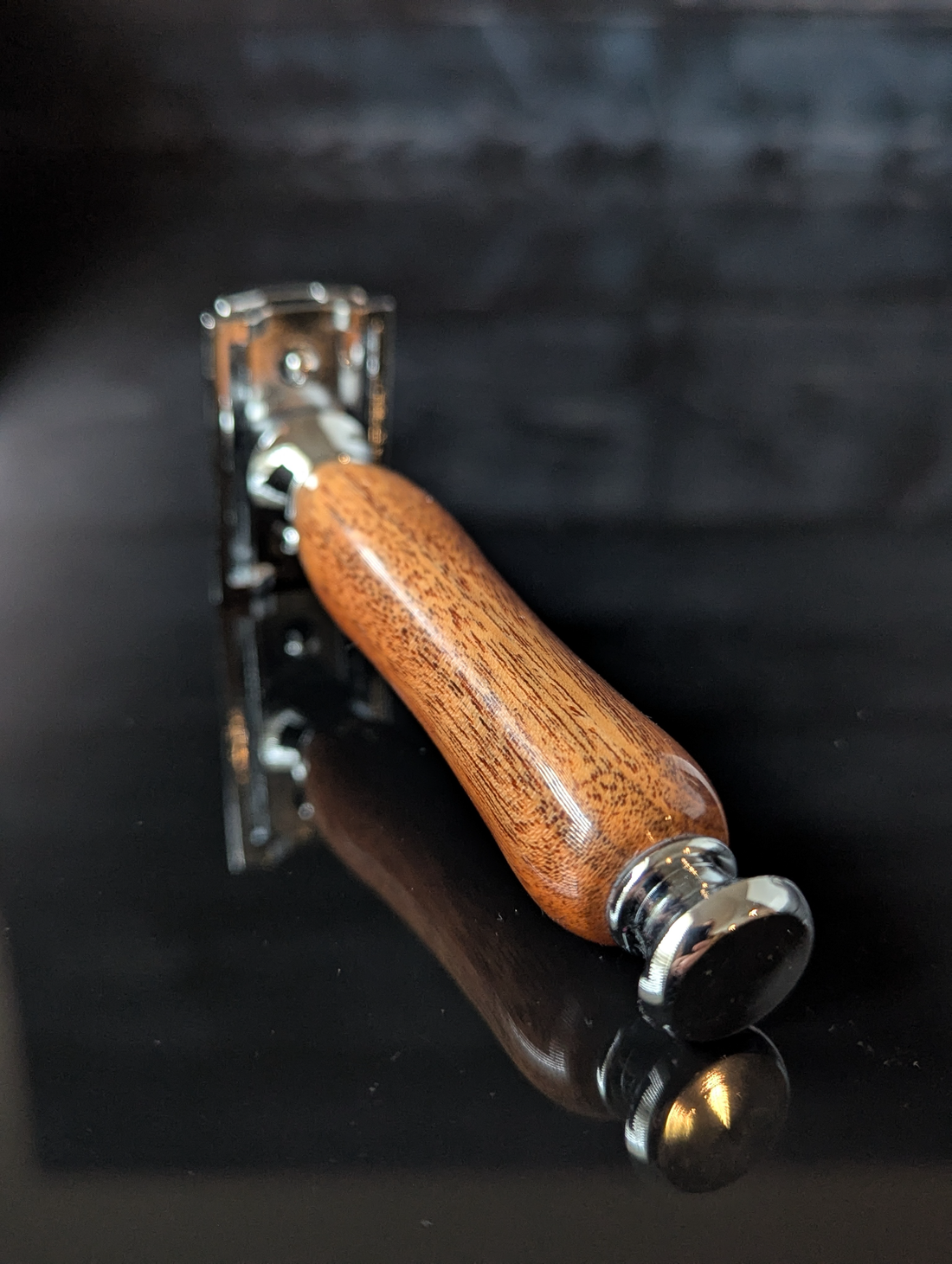 back view of a hand-crafted safety razor with a mesquite handle from MC Shave Gear