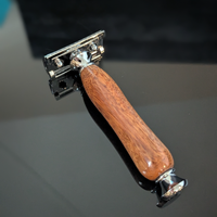 top view of a hand-crafted safety razor with a mesquite handle from MC Shave Gear