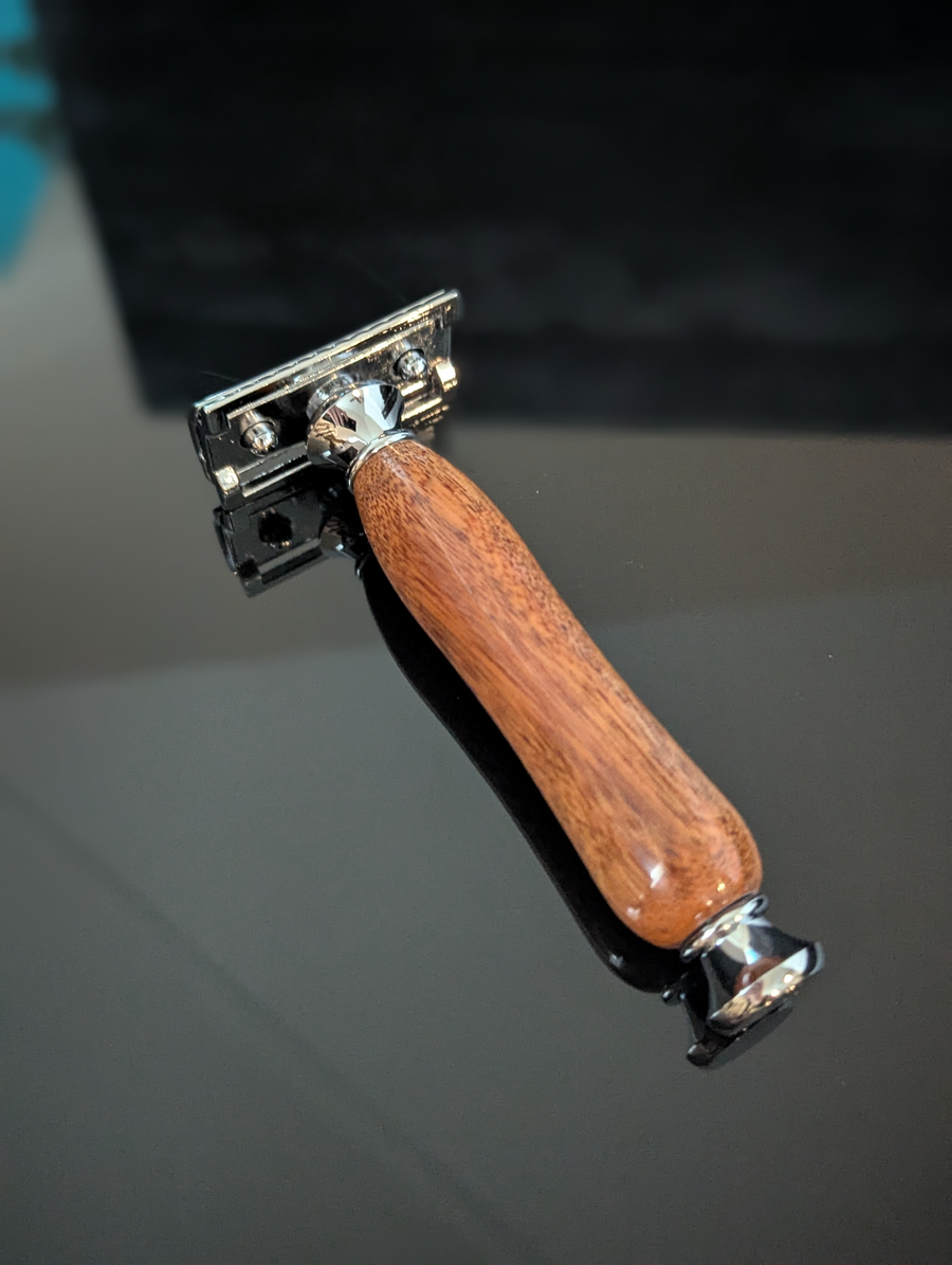 top view of a hand-crafted safety razor with a mesquite handle from MC Shave Gear