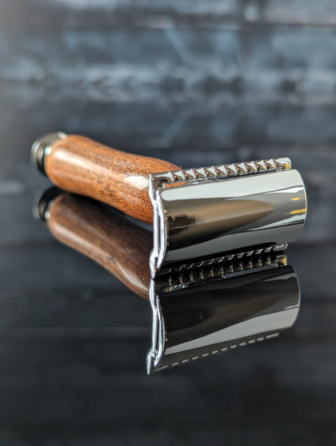 front left view of a hand-crafted safety razor with a mesquite handle from MC Shave Gear