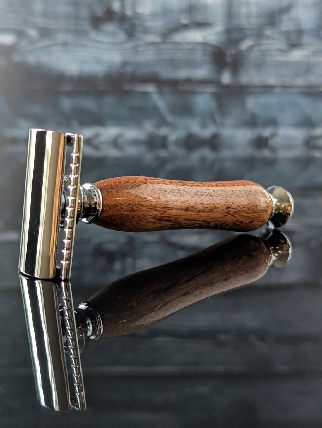 side view of a hand-crafted safety razor with a mesquite handle from MC Shave Gear