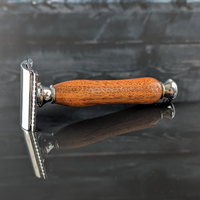 profile view of a hand-crafted safety razor with a mesquite handle from MC Shave Gear