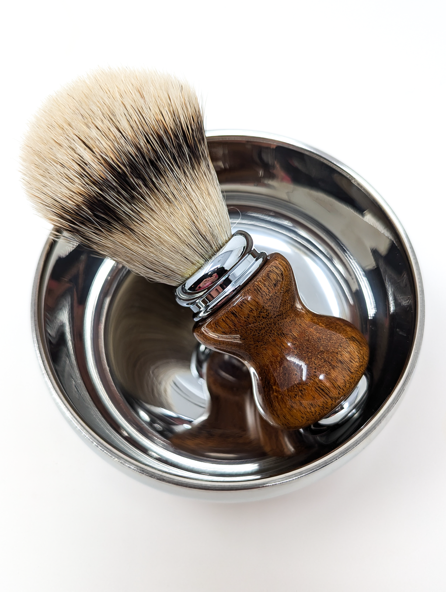 silvertip badger shave brush with a mesquite handle in a silver shave bowl